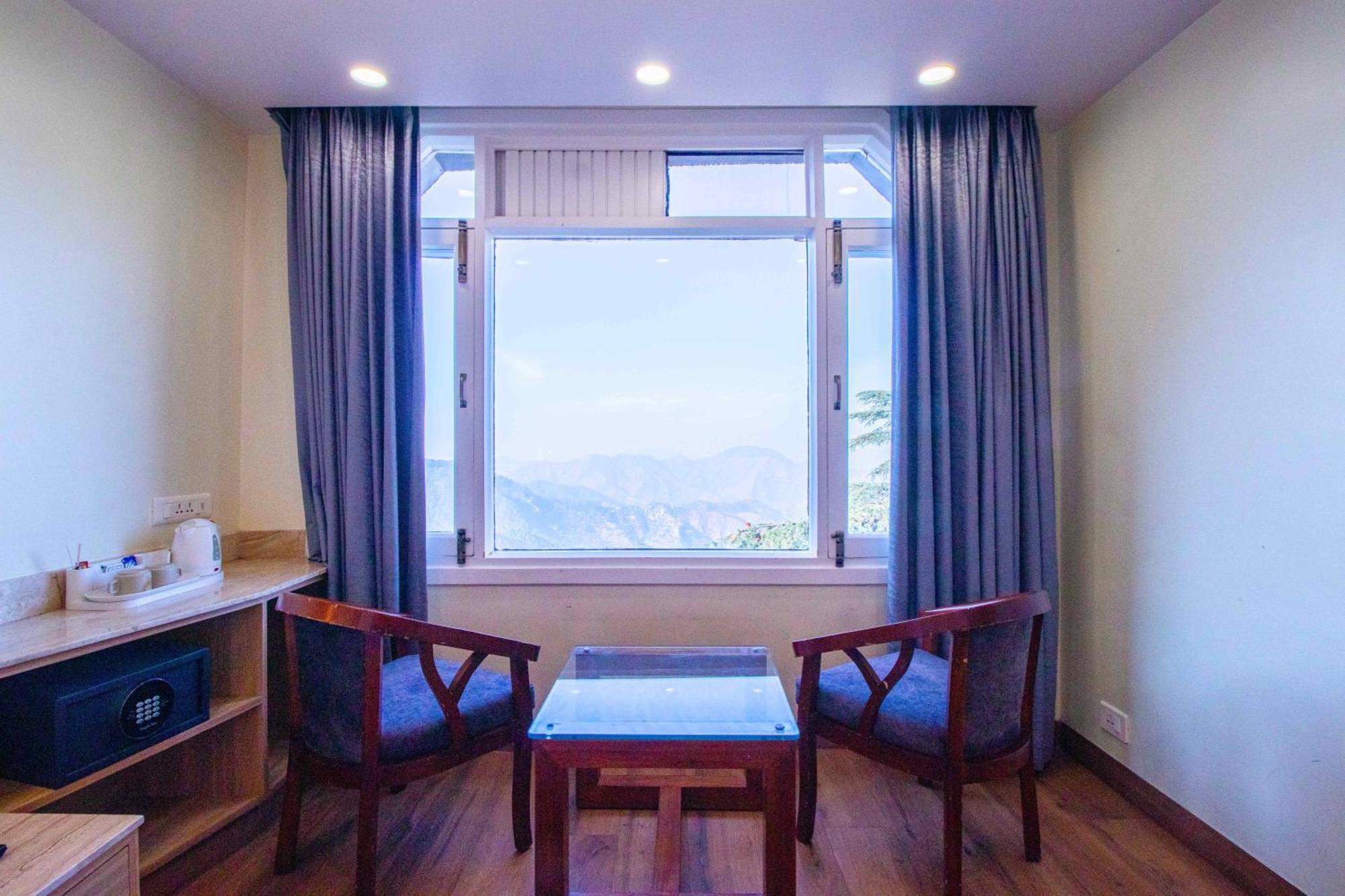 Treebo Varuna With Mountain View Hotel