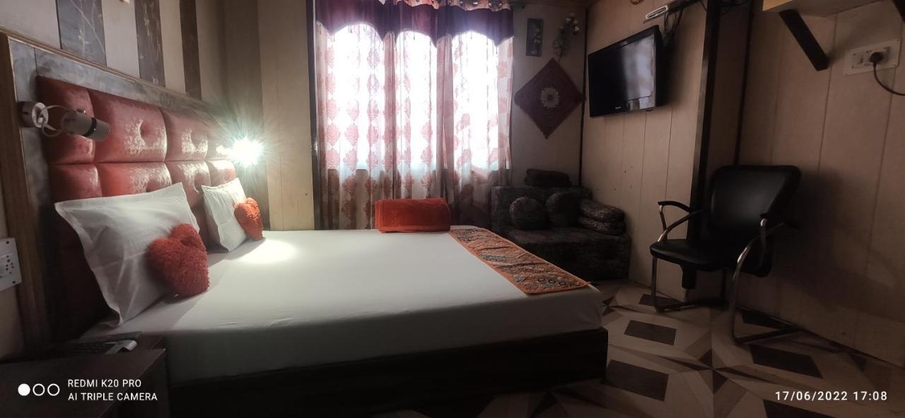 New Malook Hotel,mall Road,near Domino's Pizza Hotel Shimla
