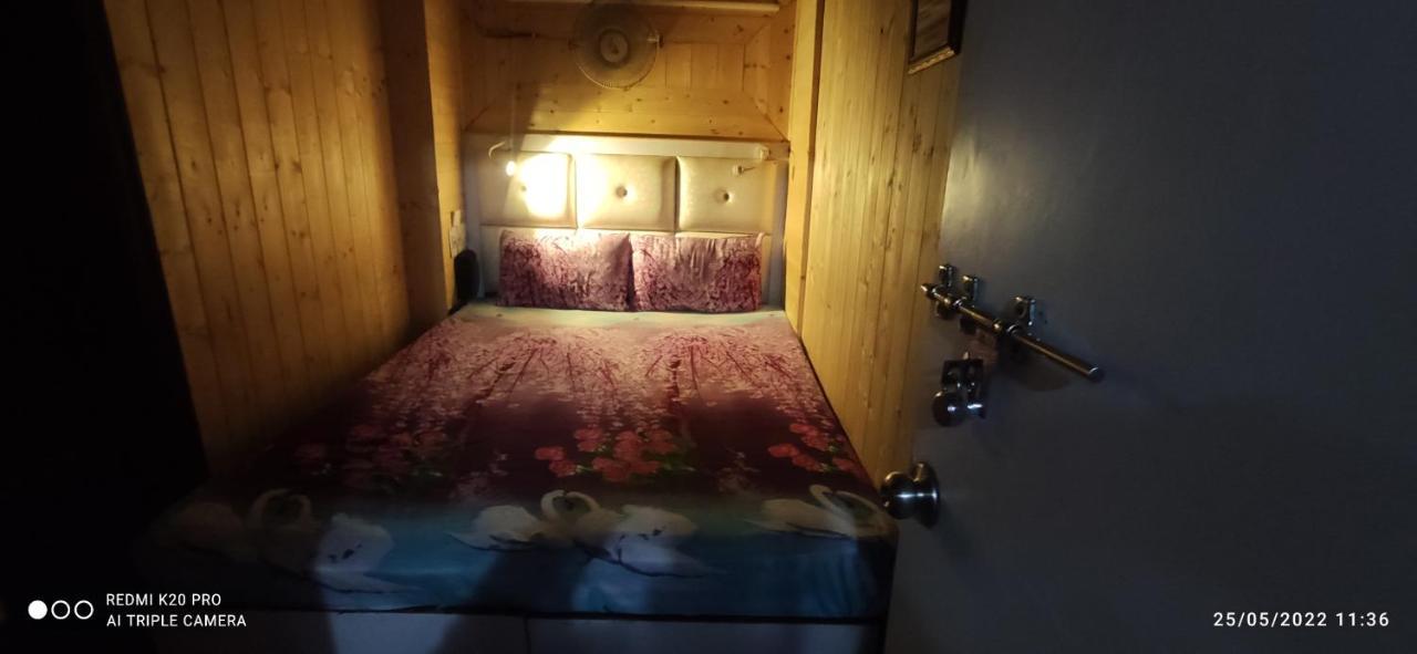 New Malook Hotel,mall Road,near Domino's Pizza Shimla