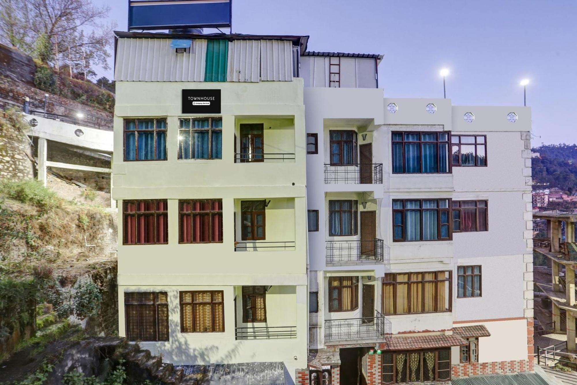 Super Townhouse Kachighati Formerly Palm Bliss Hotel *