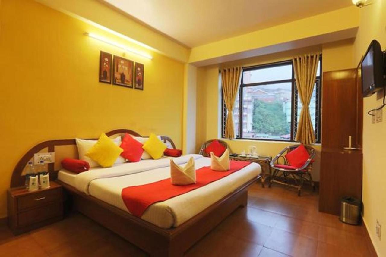 Harmony Purple Mall Road Hotel